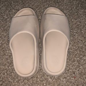 These are Yeezy slides bone colored size 10 sell these for my birthday day